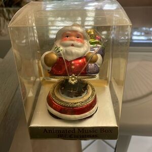 Animated Music Box Mr. Christmas plays Jingle Bells 
Never Taken out the Box